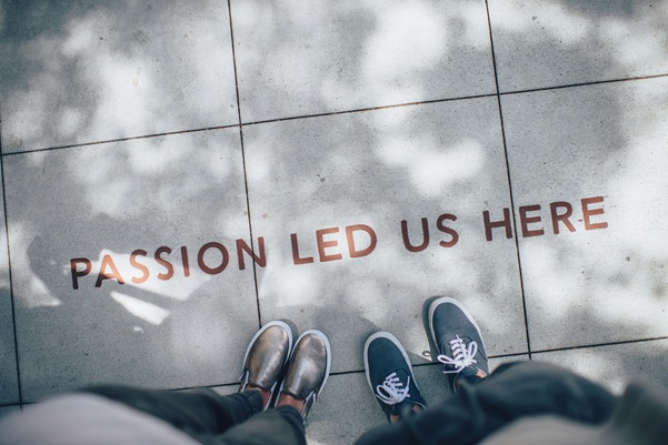 Passion written about people on concrete